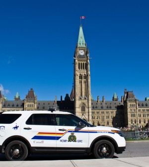 RCMP vehicle in front of Parliament Buildings, Ottawa, ON Canada